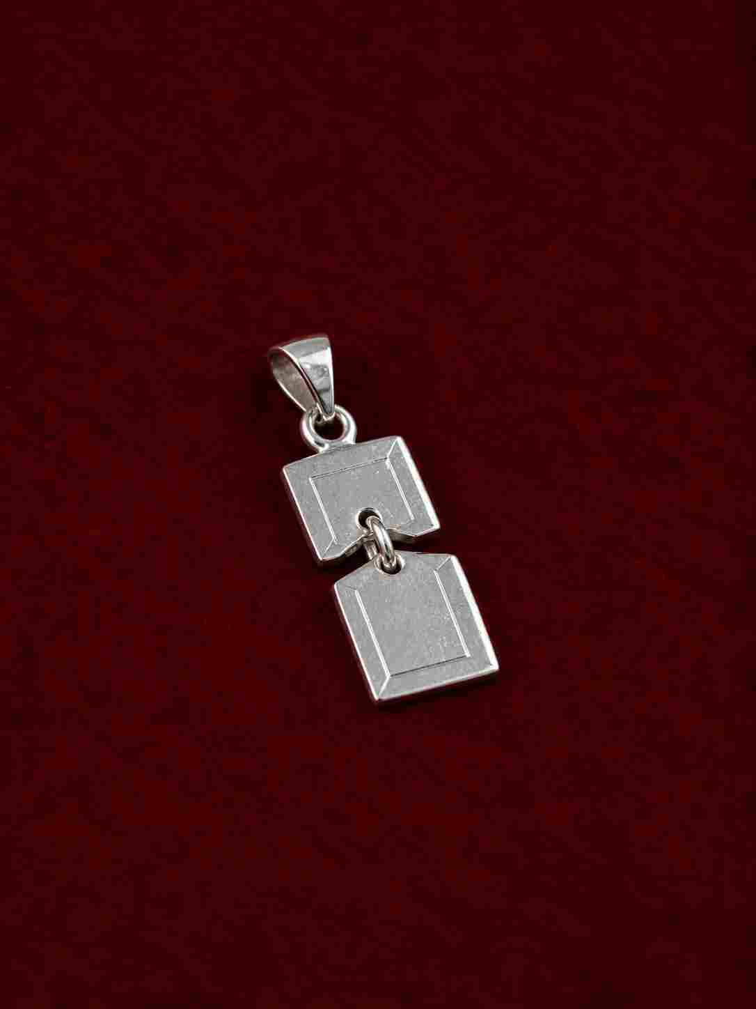 Divided Self Pendant